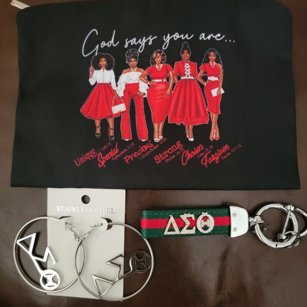 SPECIAL SALE.  DST makeup bag with earrings and keychain.